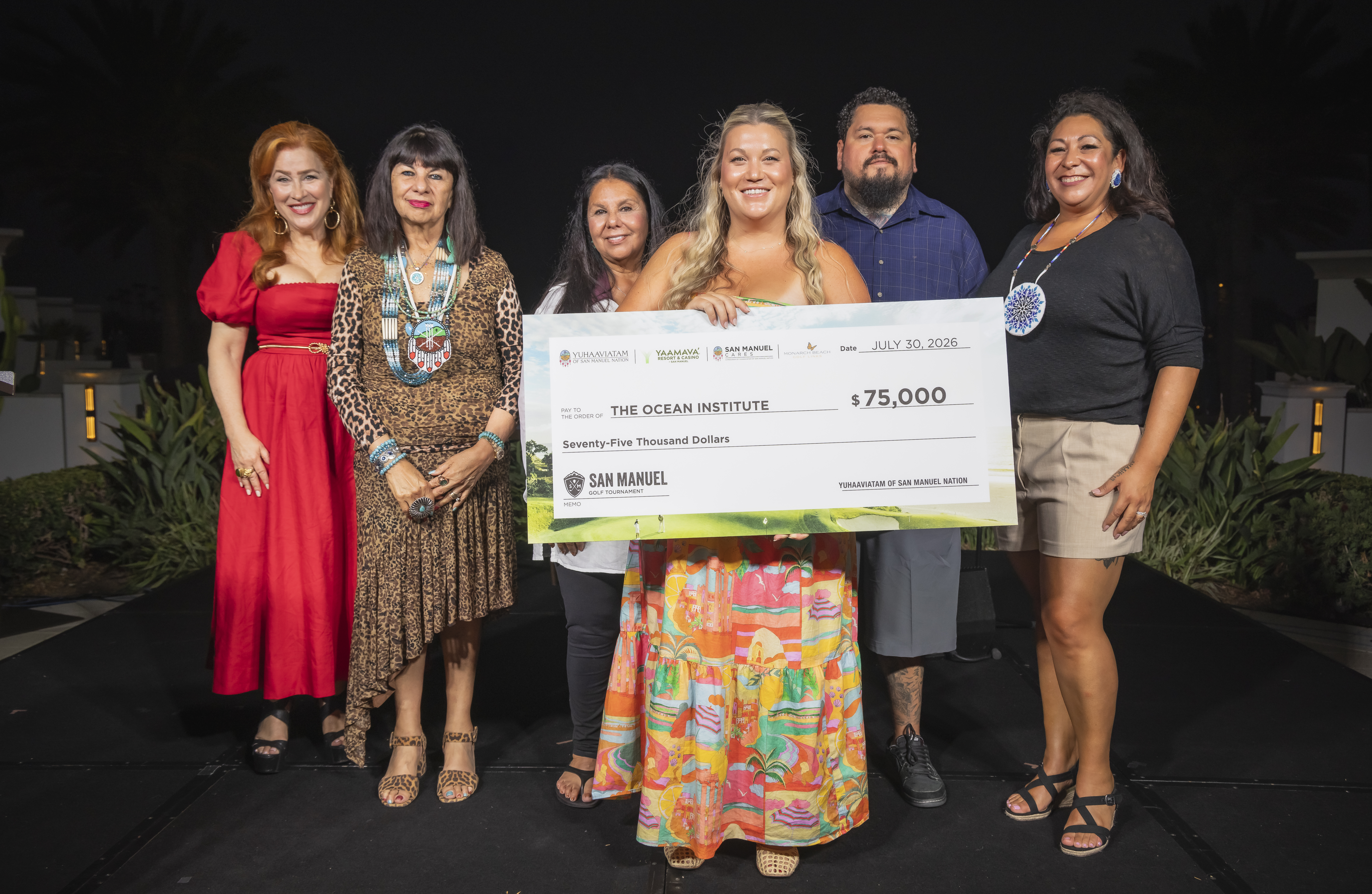 Members of Tribal Council and celebrity emcee Lisa Ann Walter appear on stage with representative of Dana Point-based Ocean Institute during Yuhaaviatam Reception.